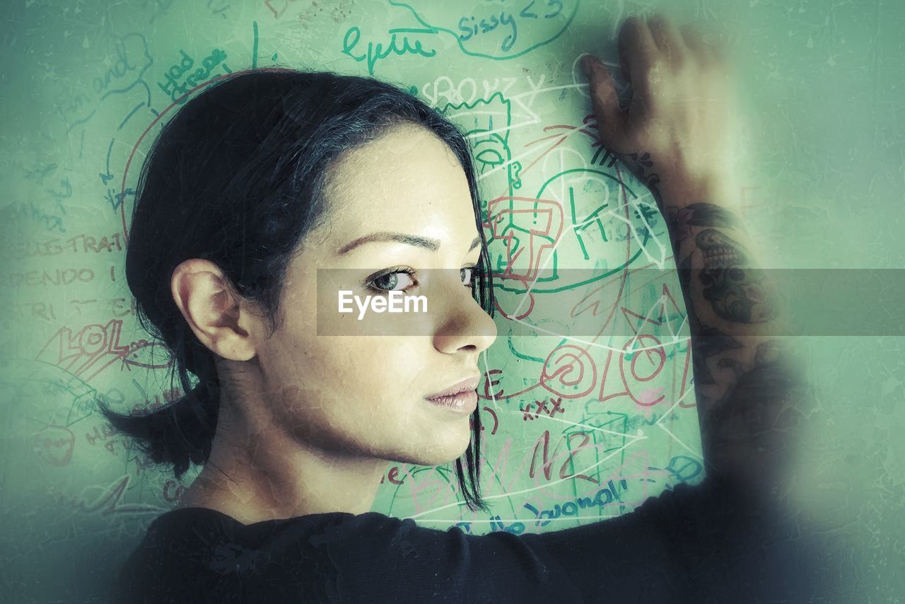 CLOSE-UP PORTRAIT OF YOUNG WOMAN WITH TEXT