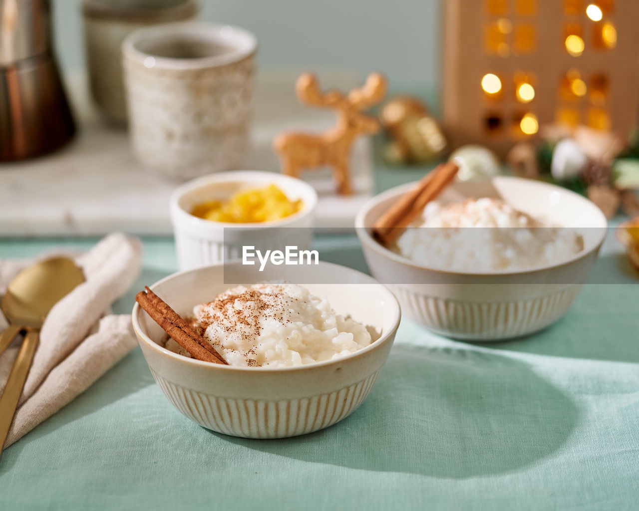 Christmas food. rice pudding. french rice dessert. christmas evening or night cozy light of lamp