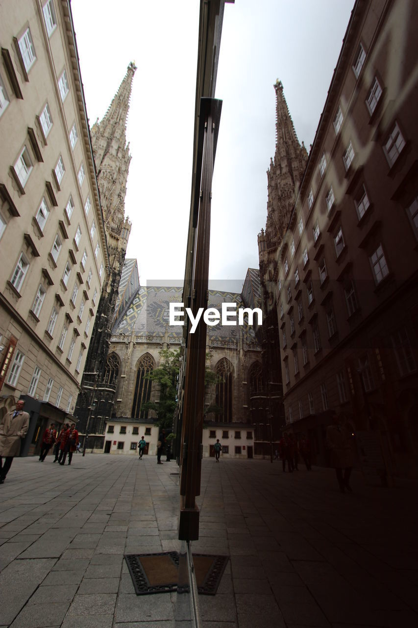 VIEW OF BUILDINGS IN CITY AGAINST SKY