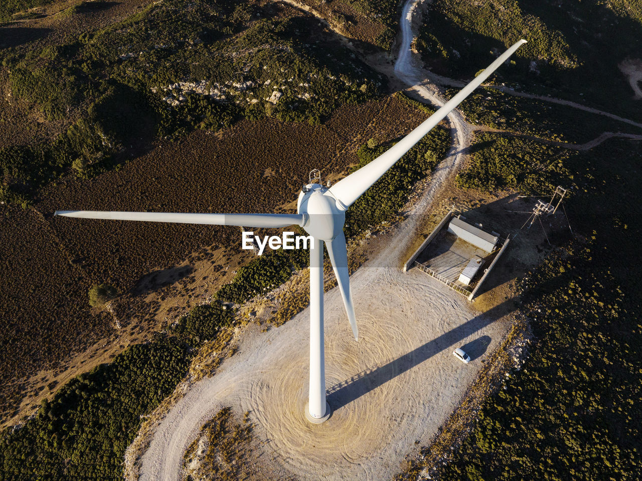 Greece, aegean, kos, aerial view of hilltop wind turbine