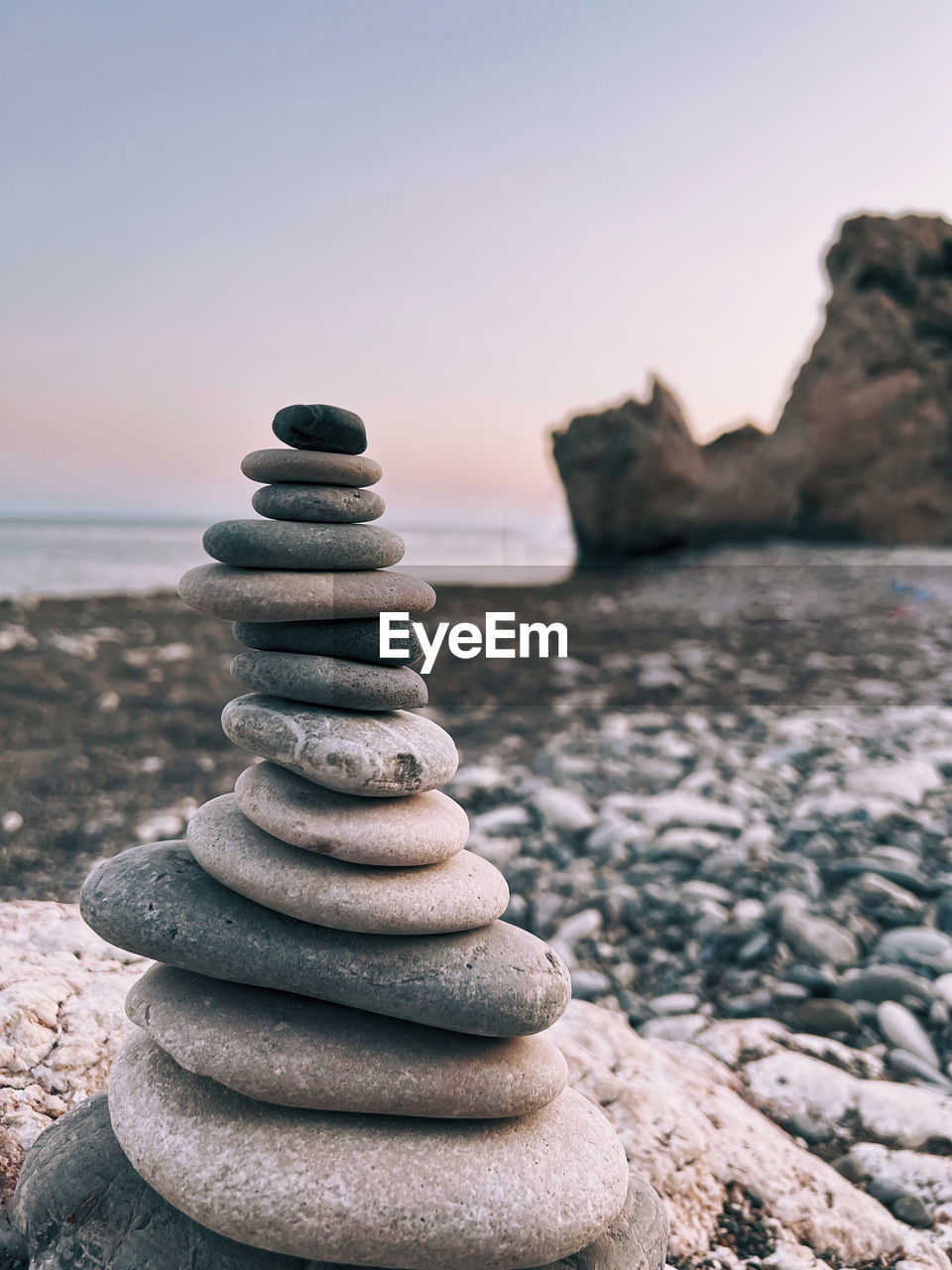 STACK OF STONES ON BEACH