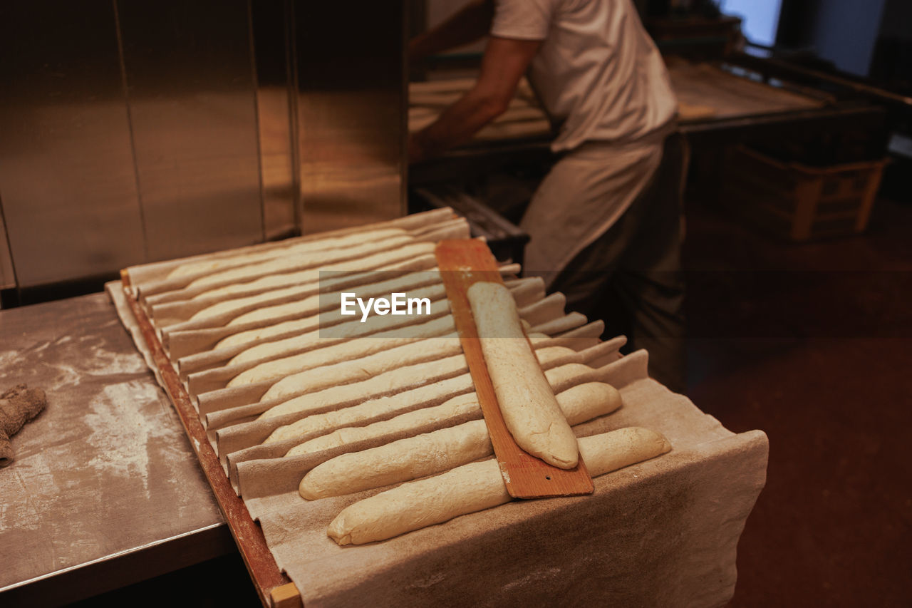 Close-up of baguettes preparing 