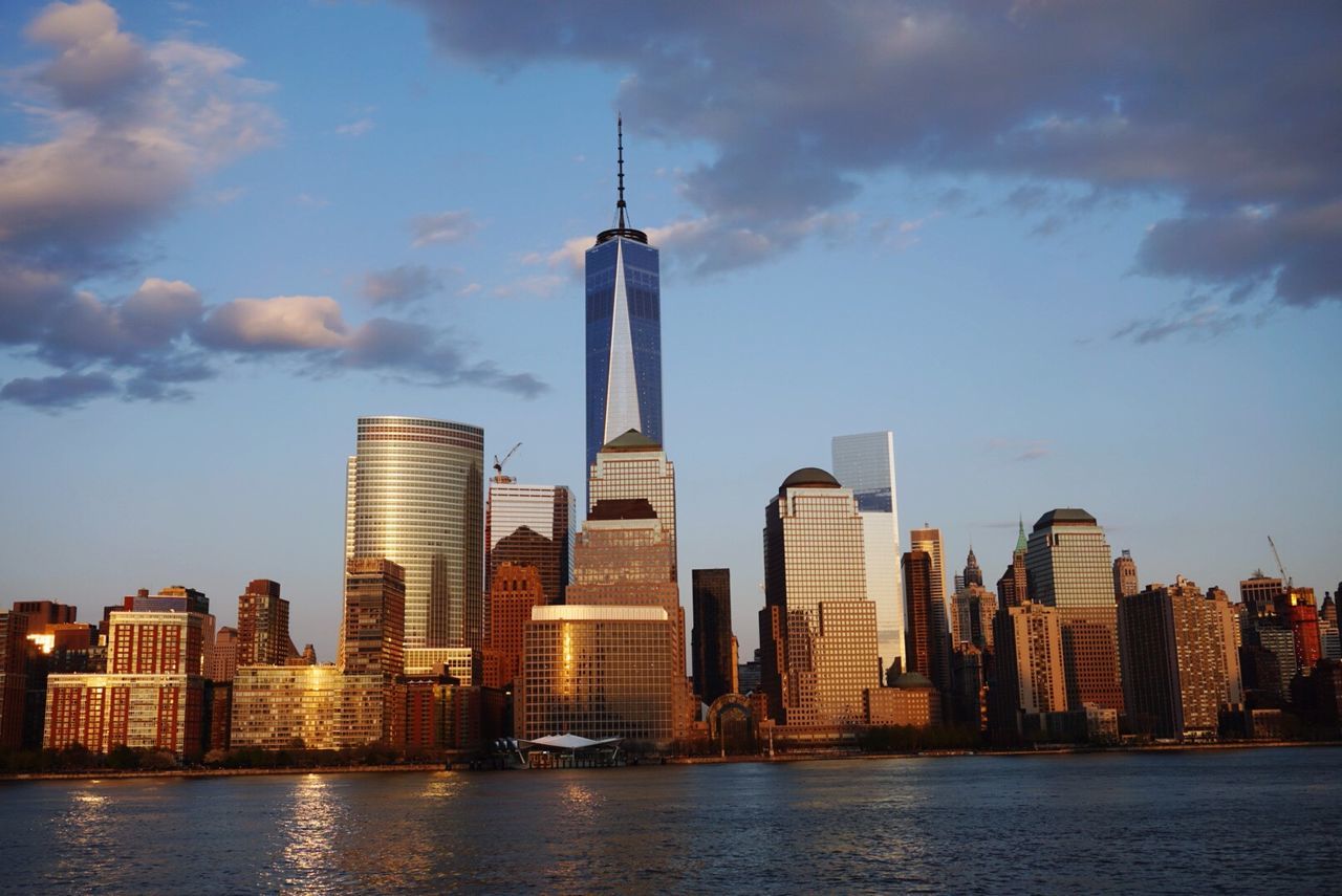 City by sea against sky