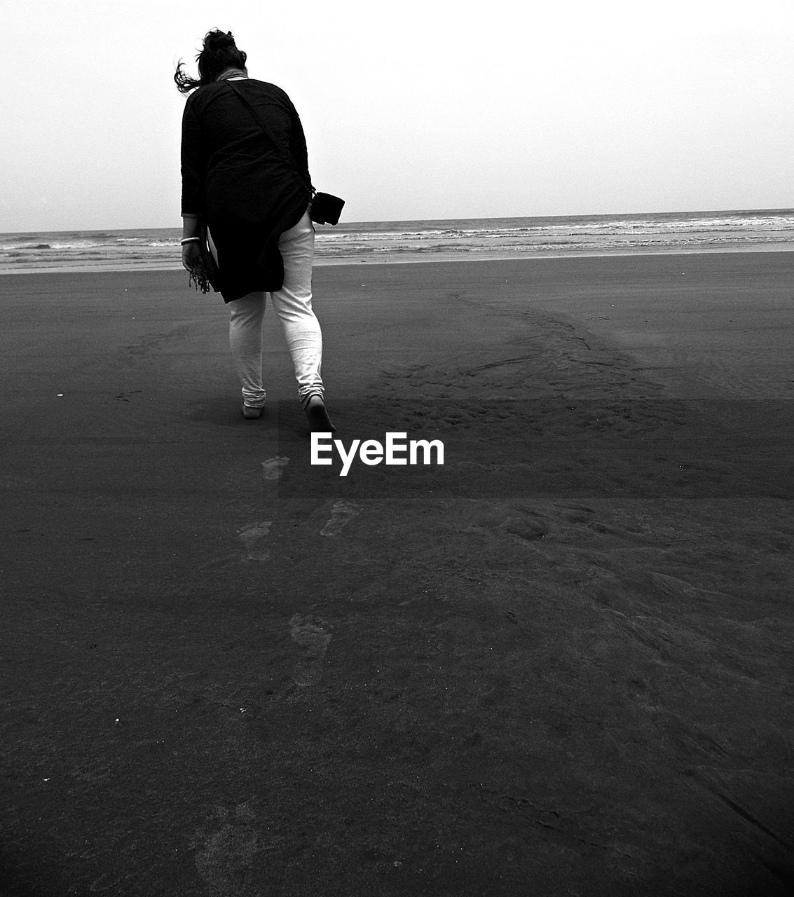 VIEW OF PEOPLE ON BEACH