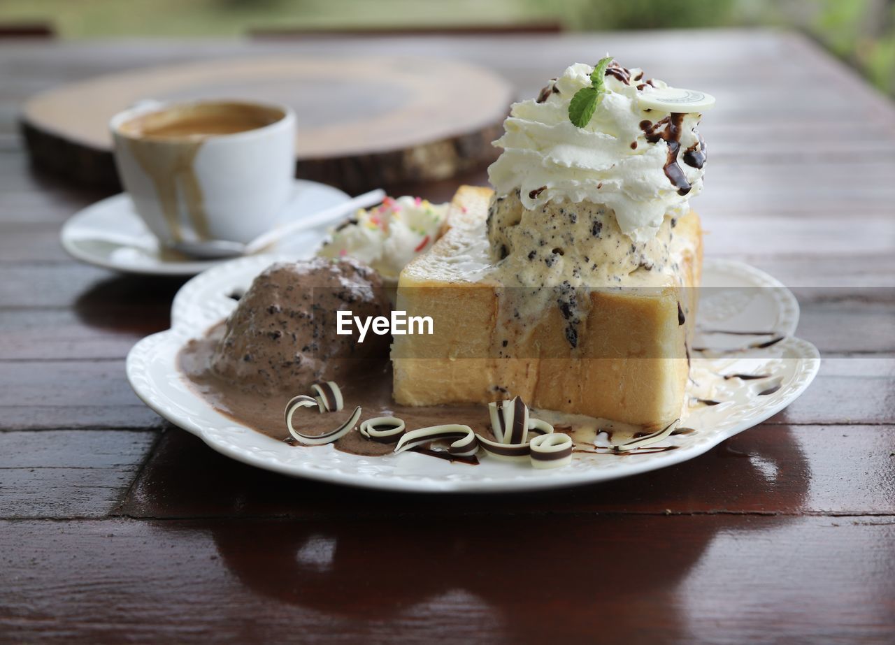 Close-up of coffee served on table