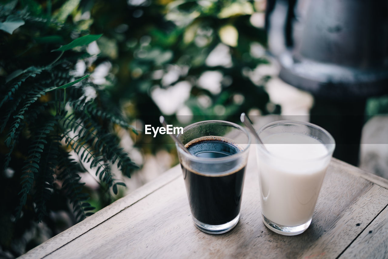 Close-up of drink in glasses on table