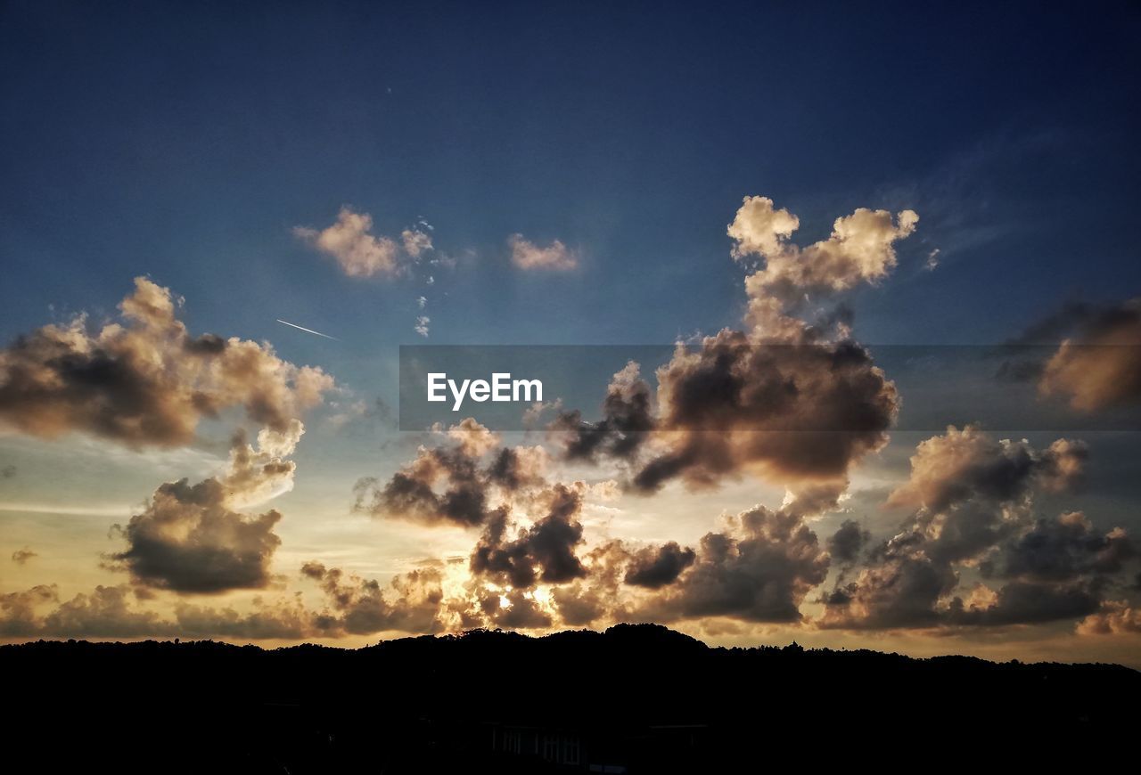 LOW ANGLE VIEW OF SKY OVER SILHOUETTE LAND