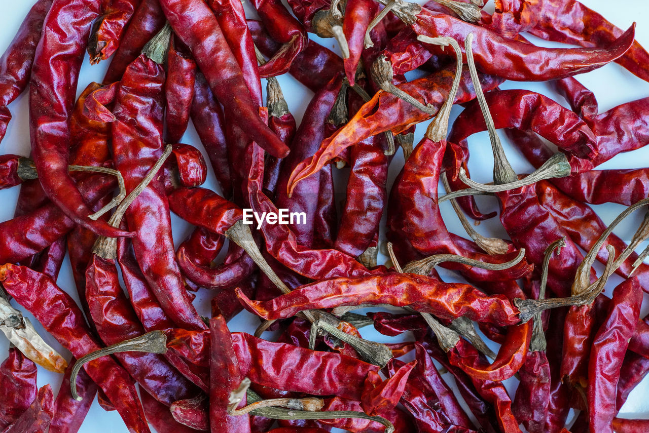 FULL FRAME SHOT OF RED CHILI PEPPERS AT MARKET
