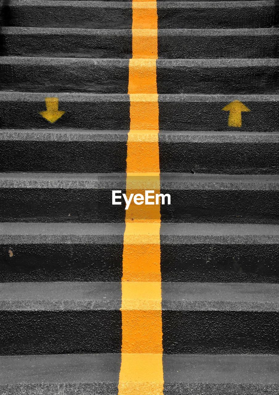 road marking, marking, yellow, symbol, crosswalk, road, zebra crossing, sign, striped, transportation, crossing, pedestrian crossing, line, no people, asphalt, city, black, pattern, street, high angle view, day, full frame, floor, flooring, road surface, architecture, outdoors, backgrounds, guidance, lane, dividing line