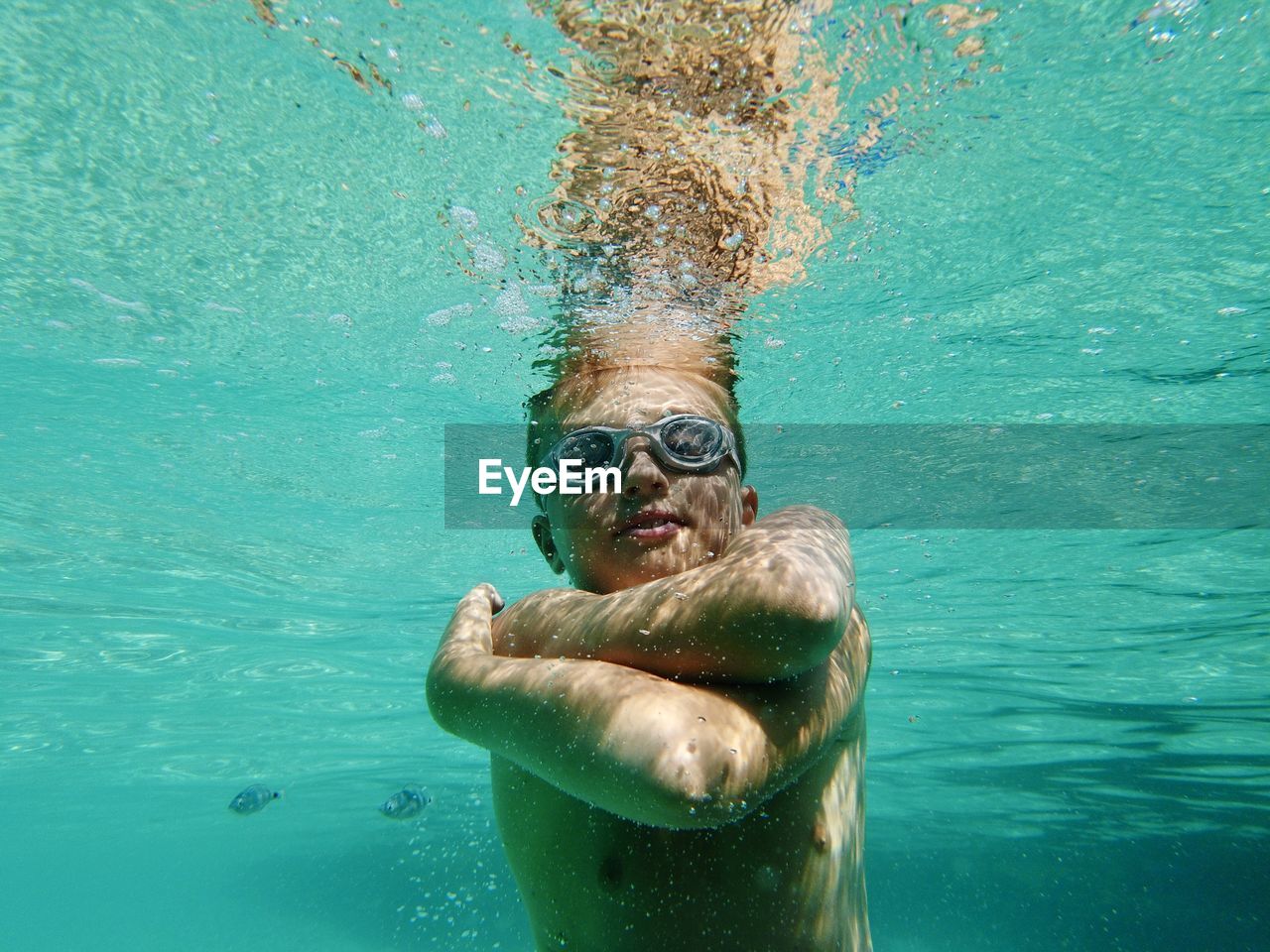 Kid swimming in sea