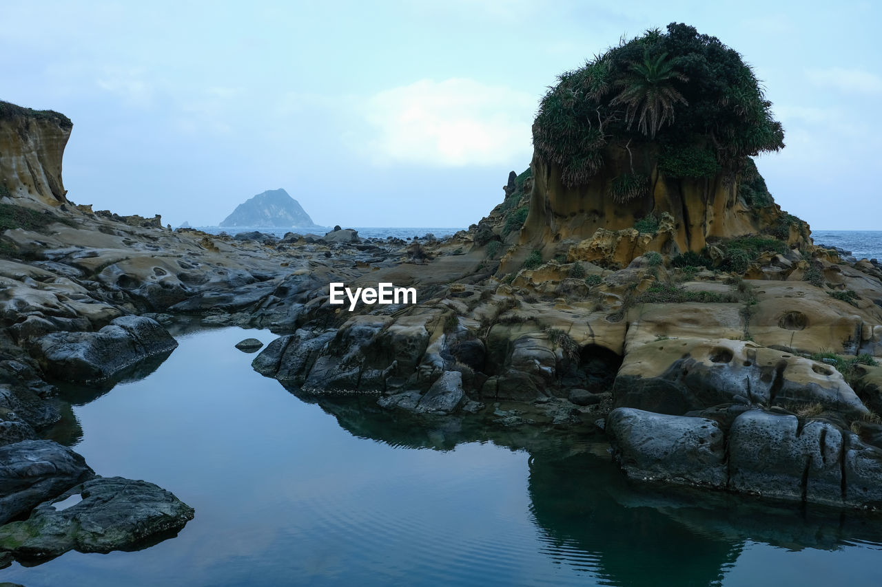 ROCK FORMATION AGAINST SKY