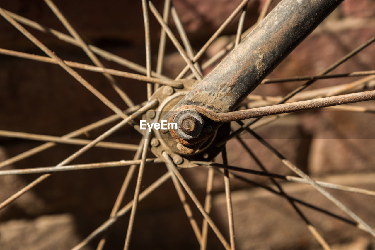 Close-up of rusty bicycle wheel