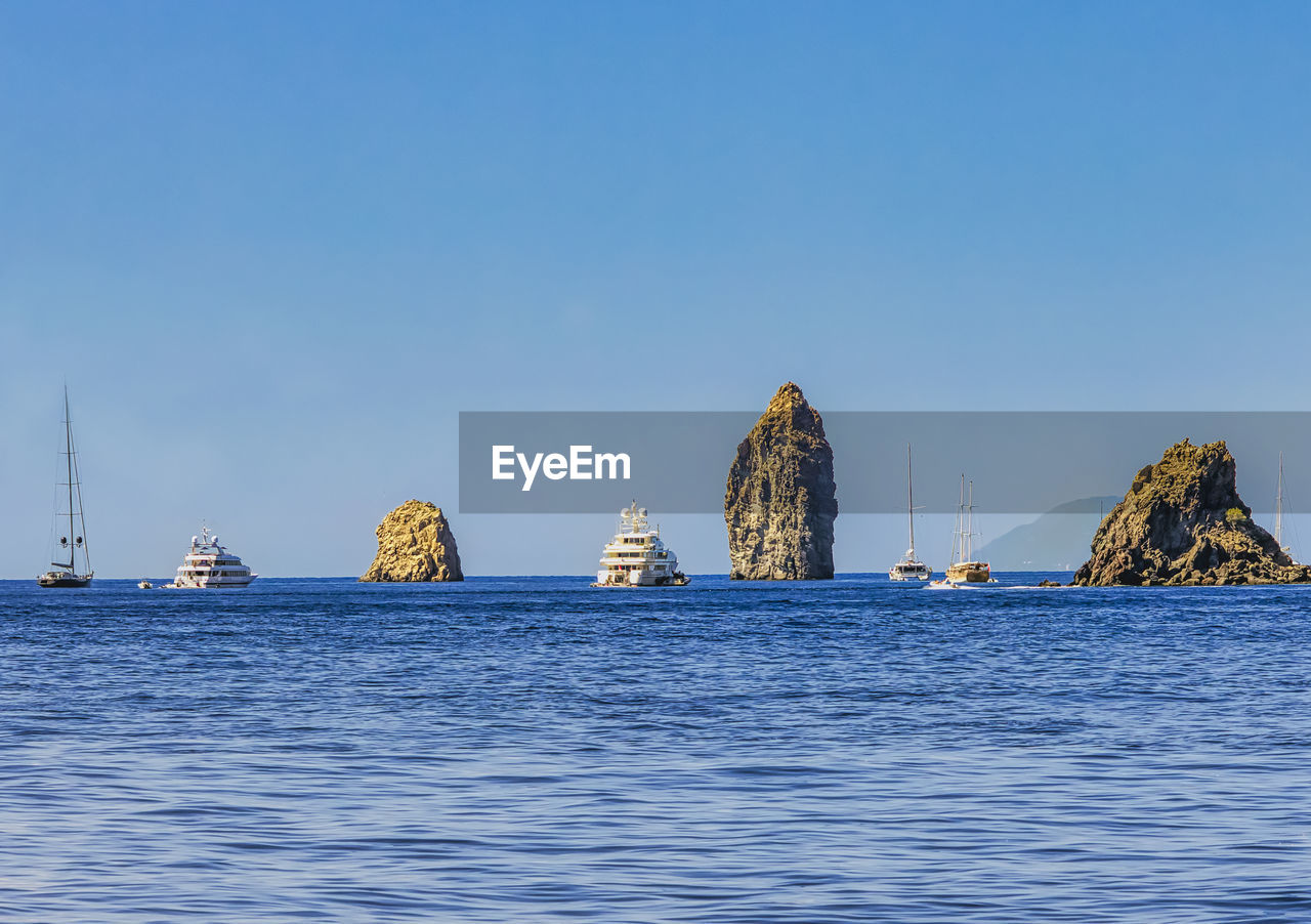 panoramic view of sea against clear blue sky