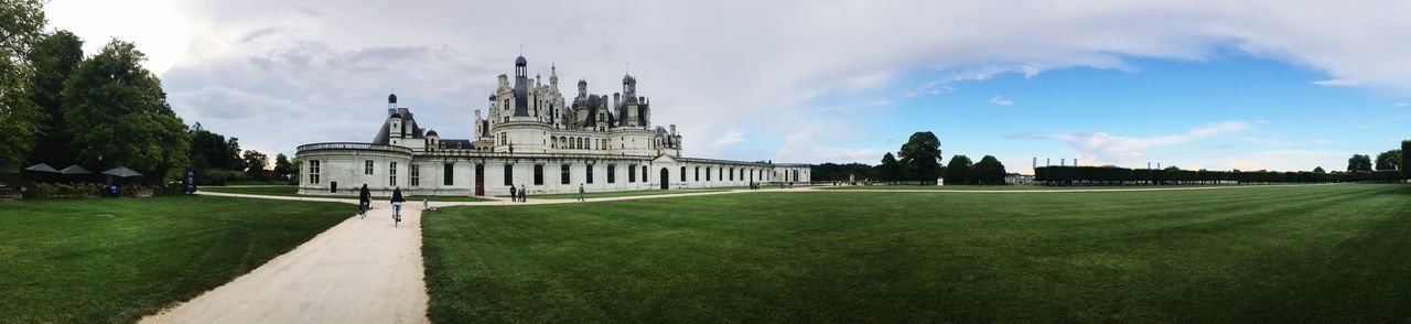 Panoramic view of castle against cloudy sky