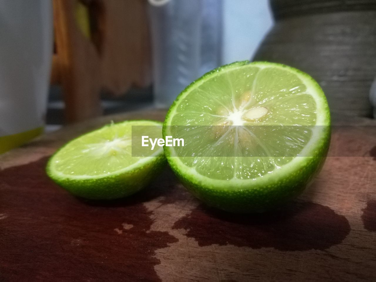 CLOSE-UP OF LEMON ON TABLE