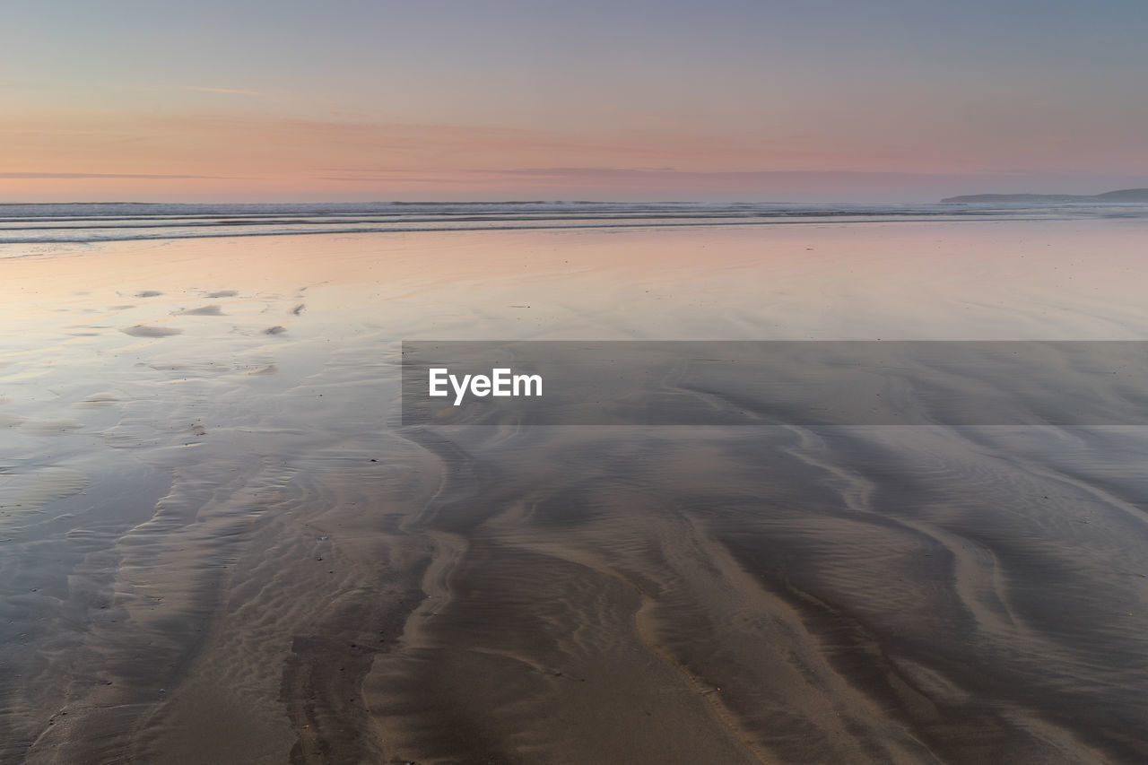 Sunset on westward ho beach, devon 