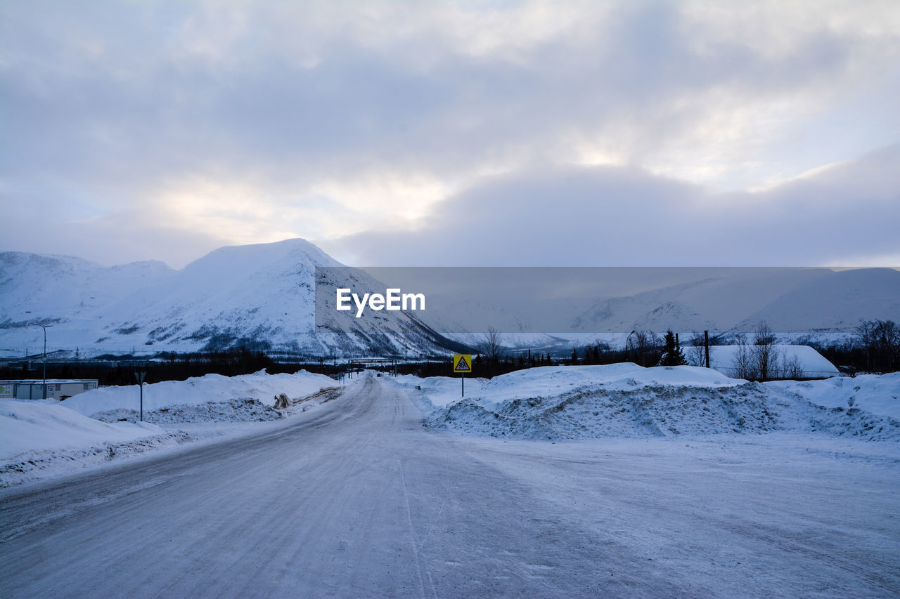 Snowcapped mountains against sky