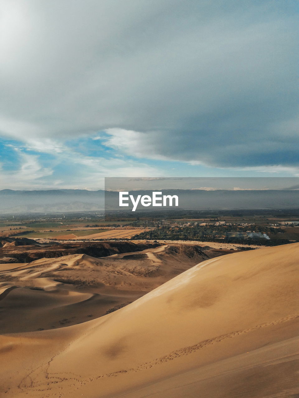 Scenic view of desert against sky