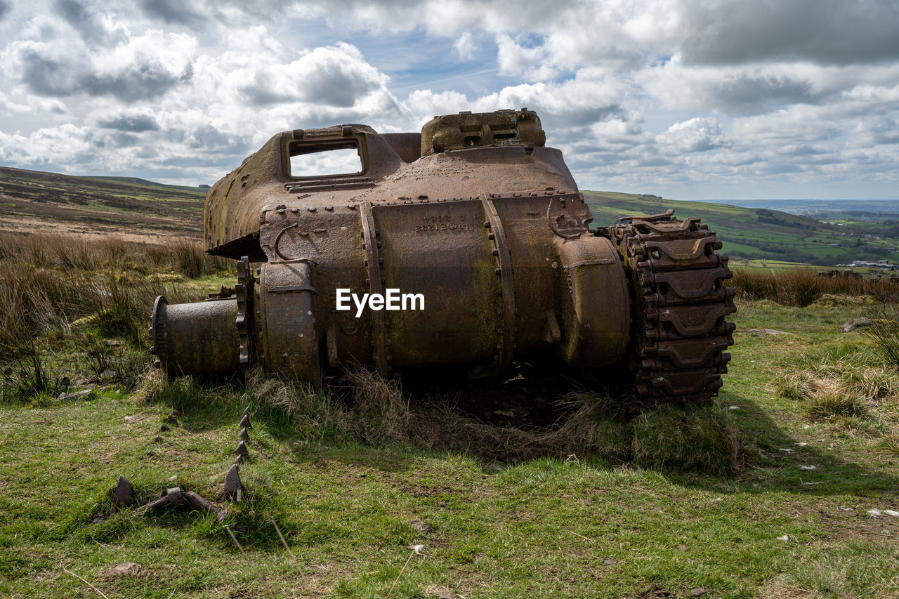 abandoned vehicle on field