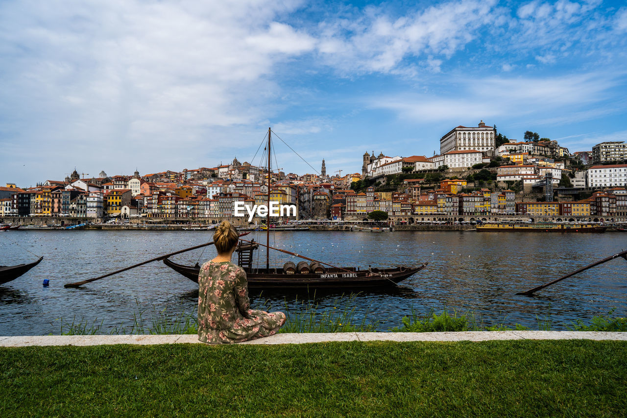 Lady looking a beautiful landscape in porto.