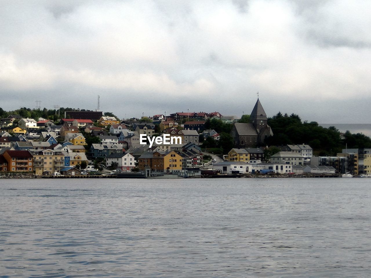 RIVER WITH CITY IN BACKGROUND