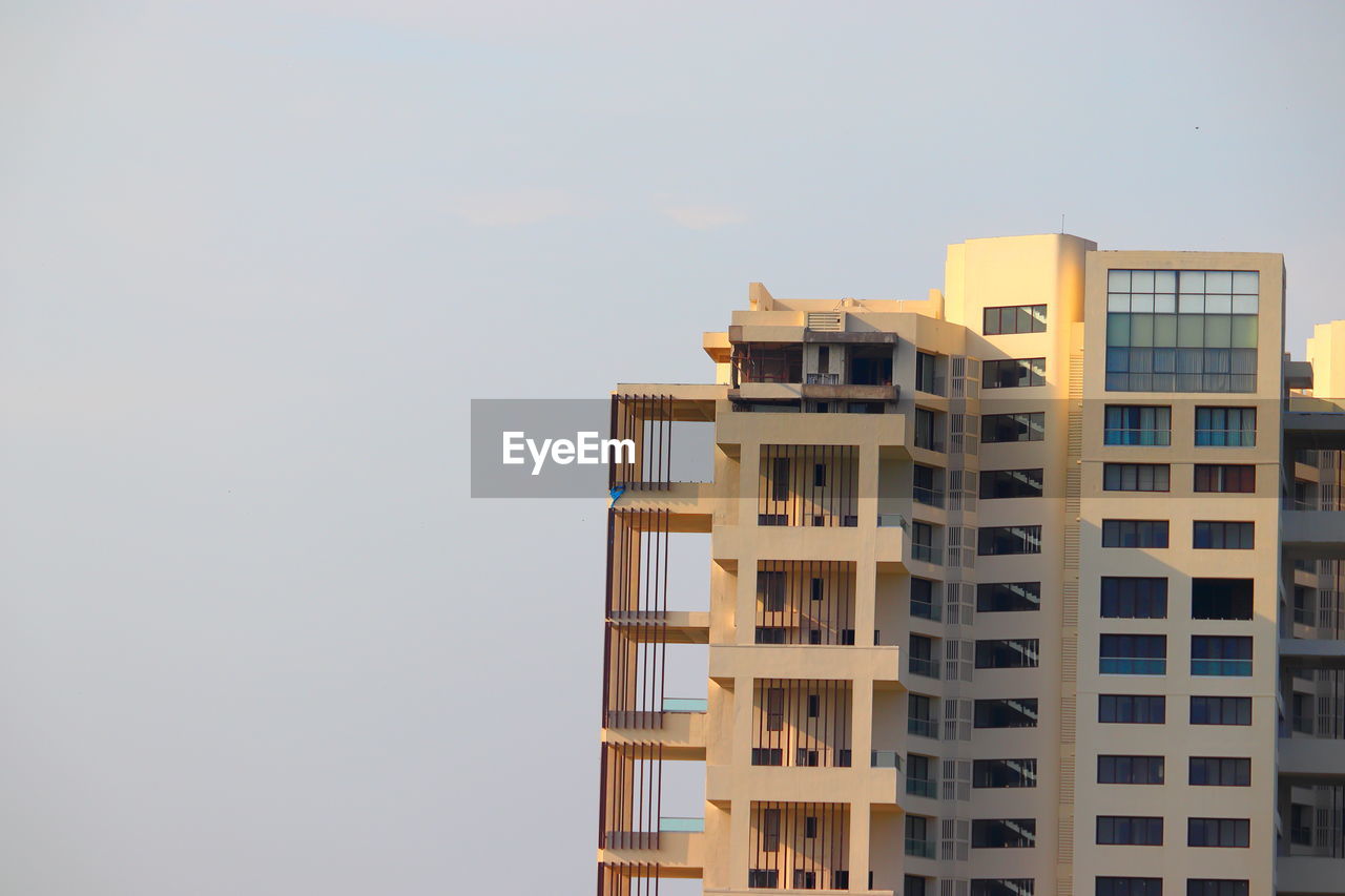 Low angle view of buildings against clear sky