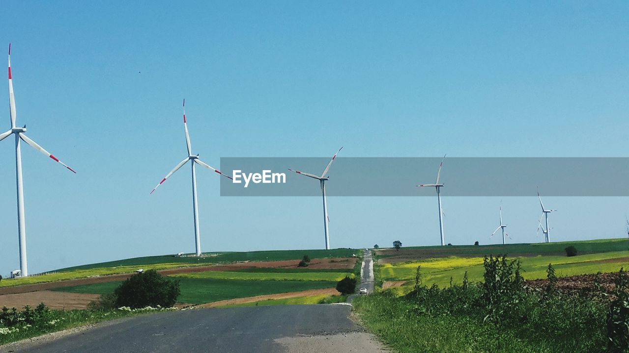 WIND TURBINES ON LANDSCAPE