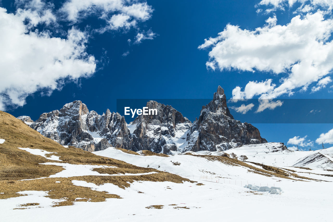 Scenic view of snowcapped mountains against sky. pale di san martino. passo rolle. dolomites. italy