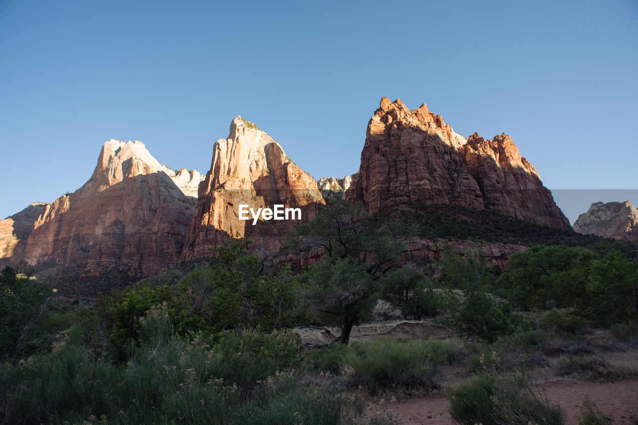 SCENIC VIEW OF ROCKY MOUNTAINS AGAINST SKY