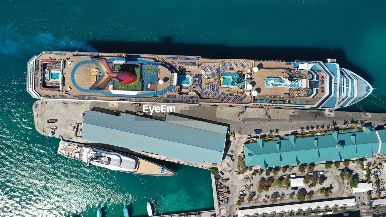 HIGH ANGLE VIEW OF OLD SHIP AT SEA SHORE