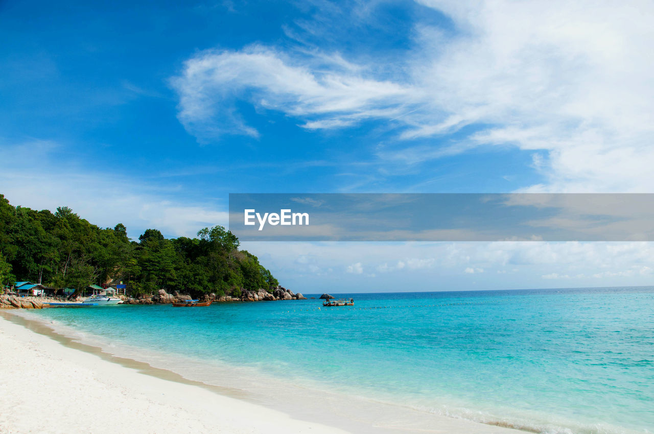 Scenic view of beach against sky