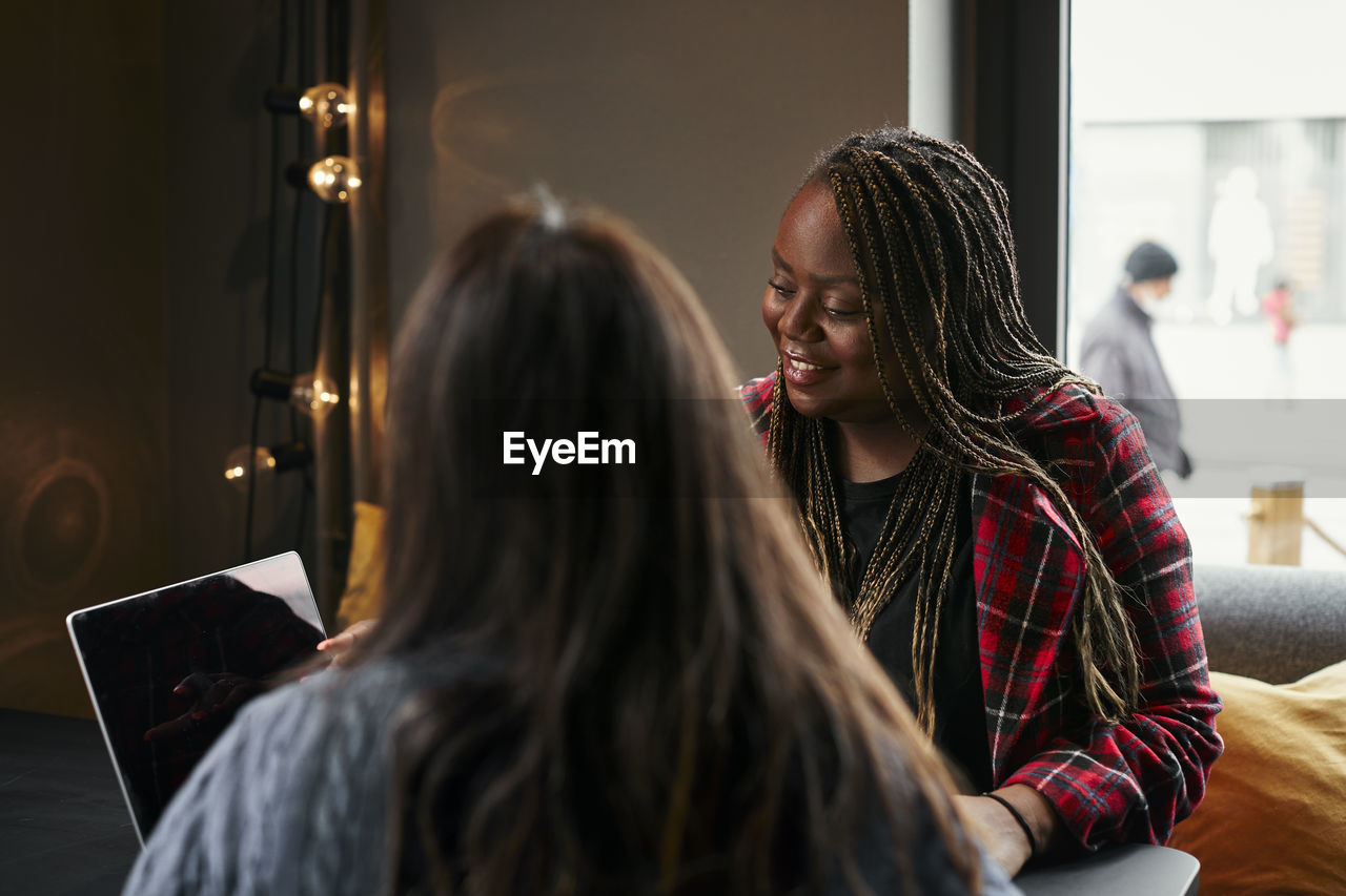 Coworkers talking during break
