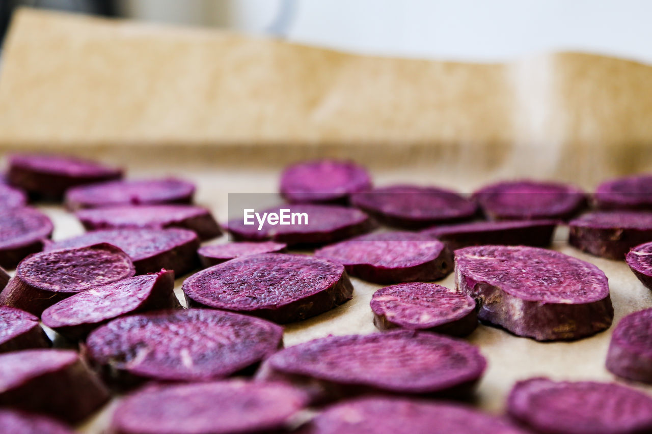 Close-up of chopped sweet potato on cutting board 