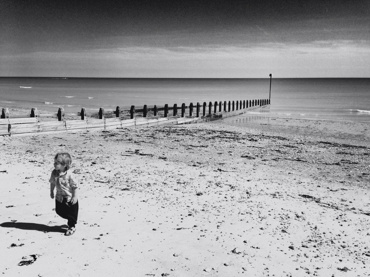 VIEW OF PIER ON SEA