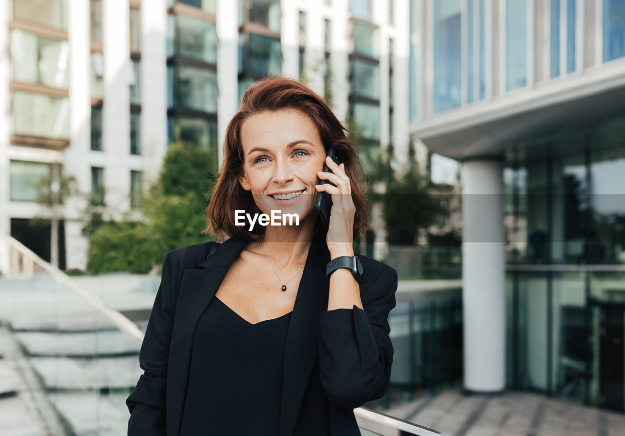 businesswoman talking on mobile phone