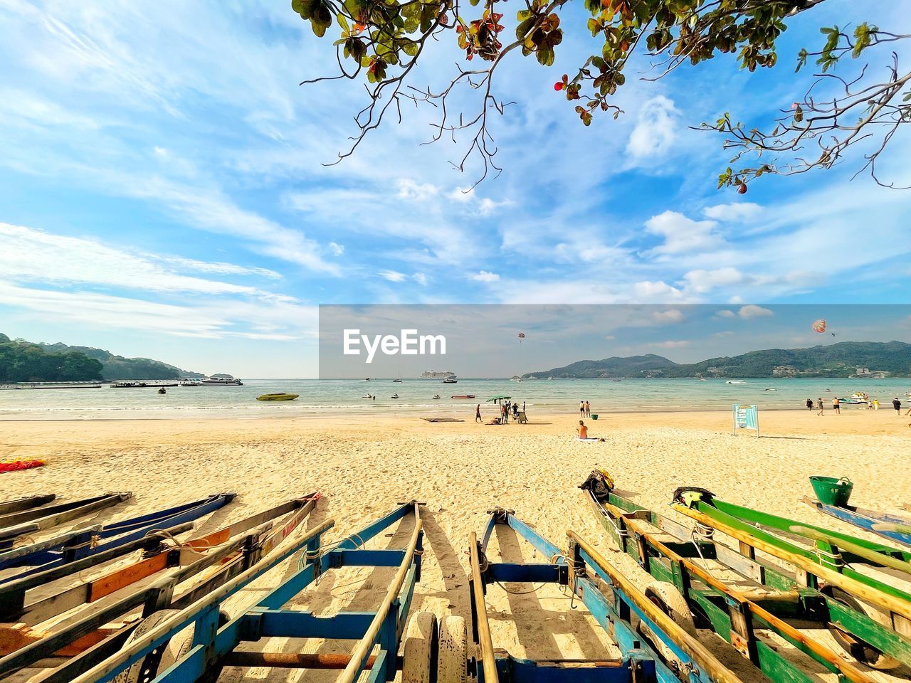 sky, water, land, beach, nature, sea, shore, cloud, scenics - nature, beauty in nature, sand, tree, nautical vessel, day, tranquility, transportation, tranquil scene, sunlight, travel, body of water, travel destinations, coast, wood, holiday, outdoors, plant, blue, landscape, vacation, trip, mode of transportation, environment, no people, idyllic, tourism, non-urban scene, pier, ocean