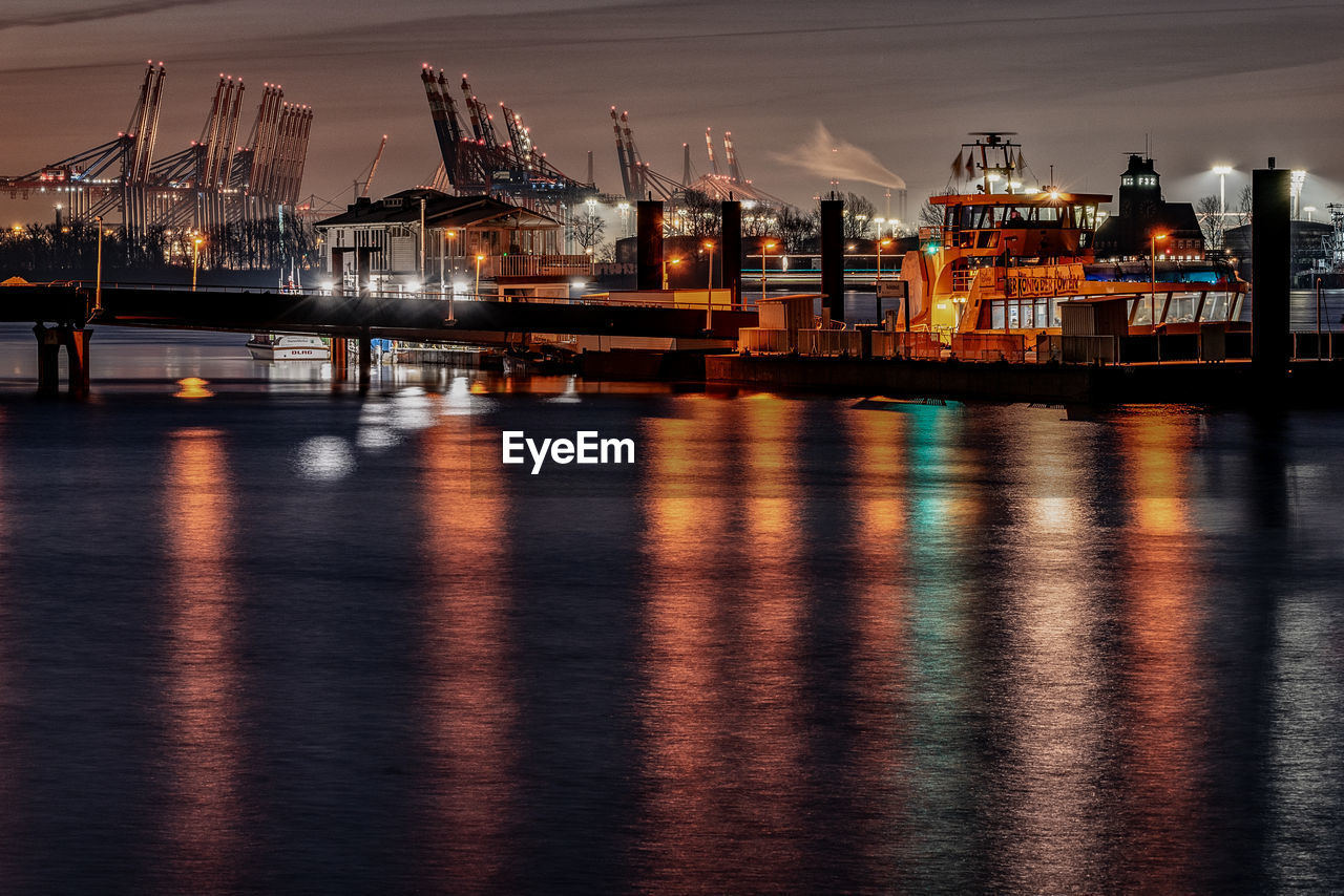 ILLUMINATED PIER AT HARBOR