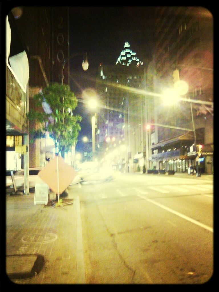 VIEW OF ILLUMINATED STREET LIGHT AT NIGHT