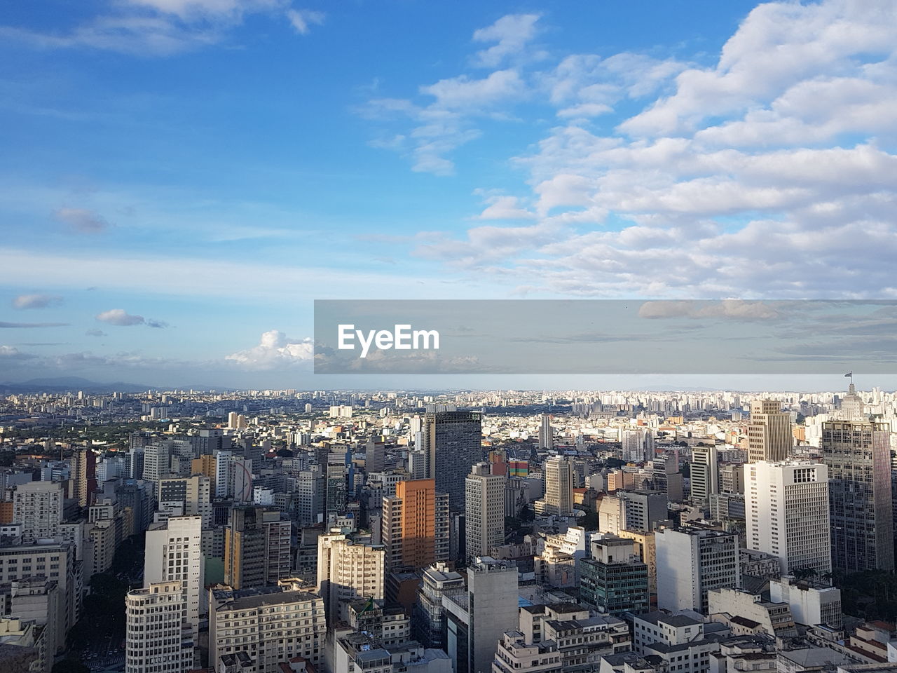 High angle view of buildings against sky in city