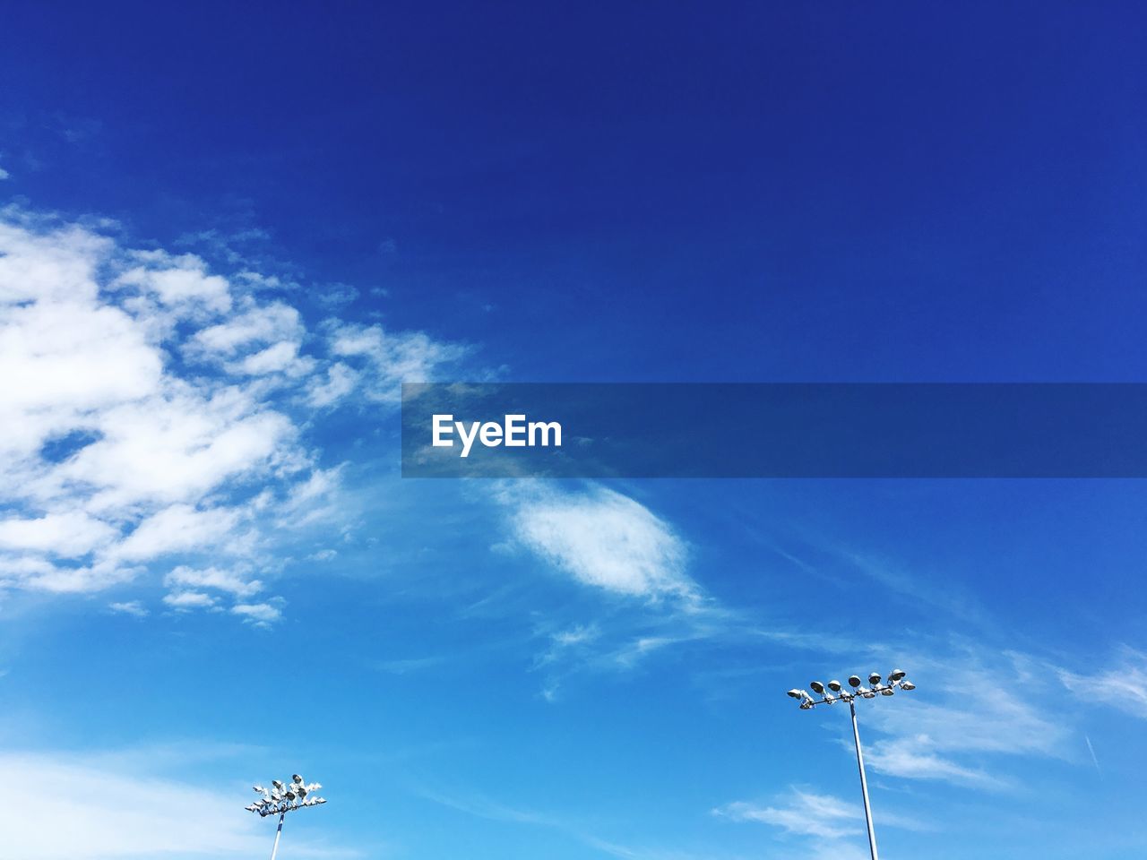 LOW ANGLE VIEW OF AIRPLANE AGAINST SKY