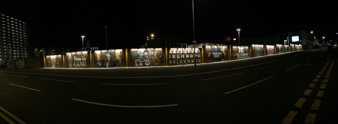 VIEW OF ILLUMINATED STREET LIGHTS IN CITY