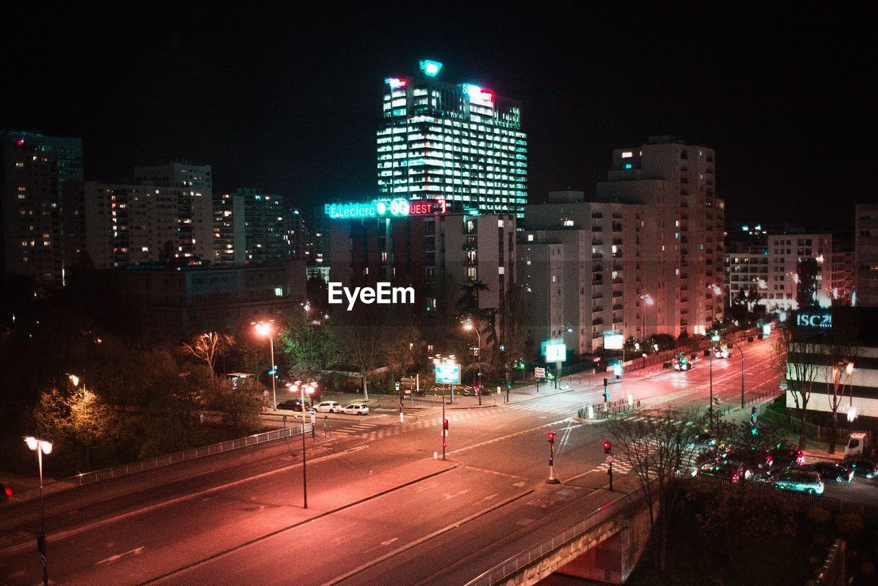 View of city lit up at night