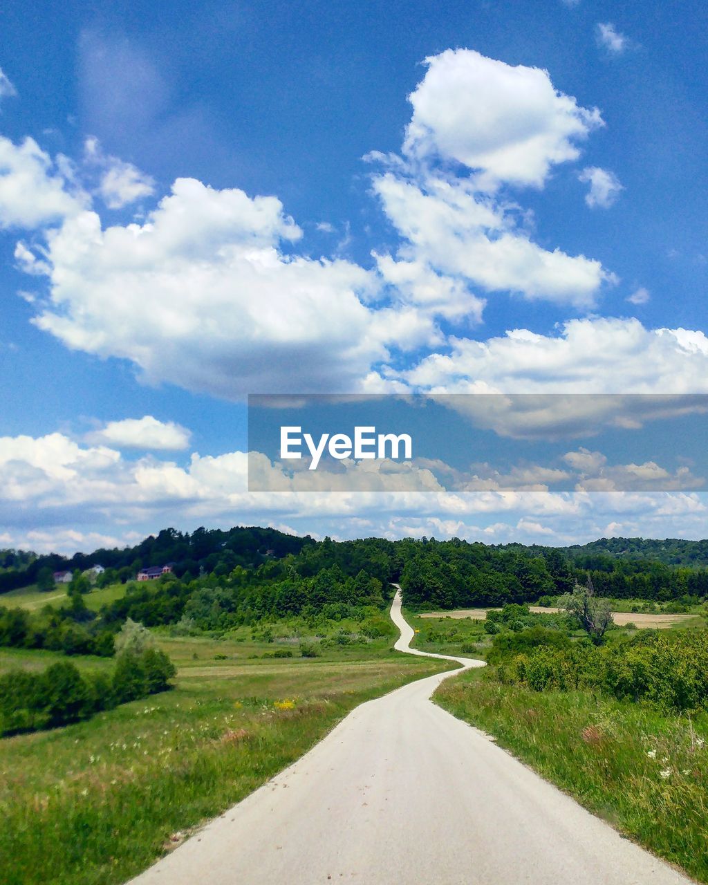 ROAD ON LANDSCAPE AGAINST SKY