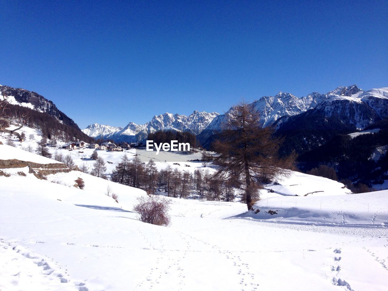 Scenic view of snowy landscape against sky