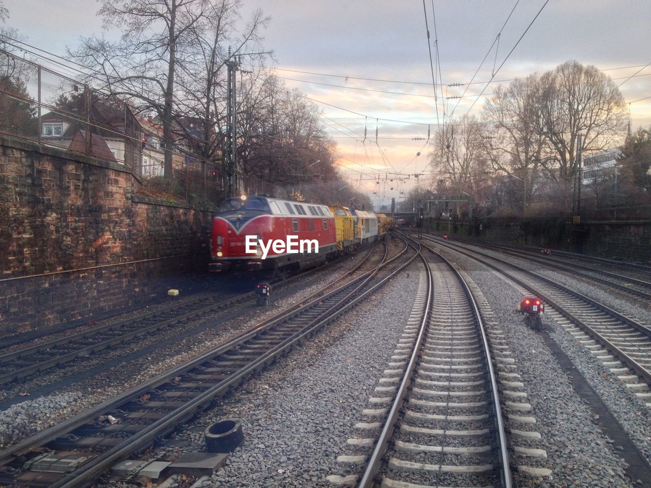 Train against sky at sunset