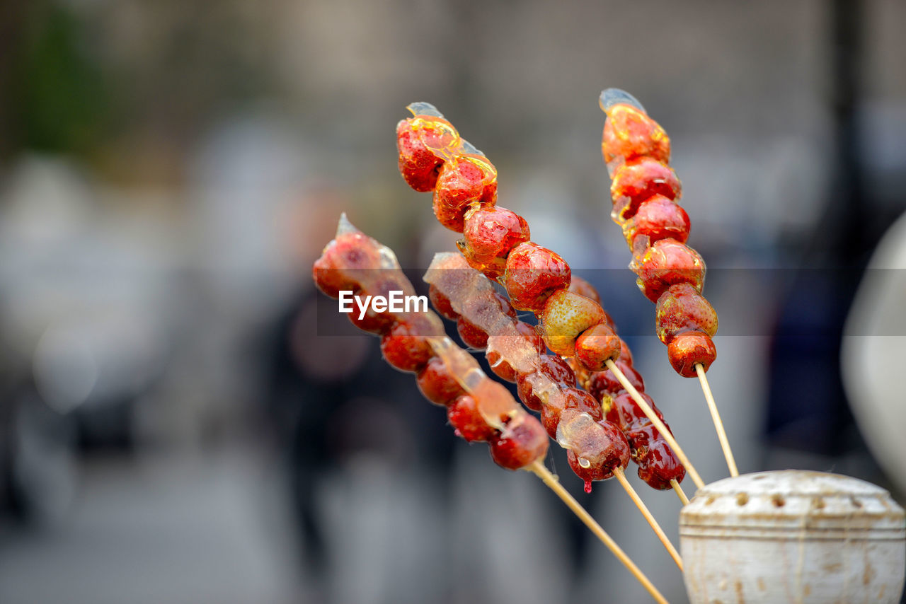 CLOSE-UP OF MEAT ON BARBECUE