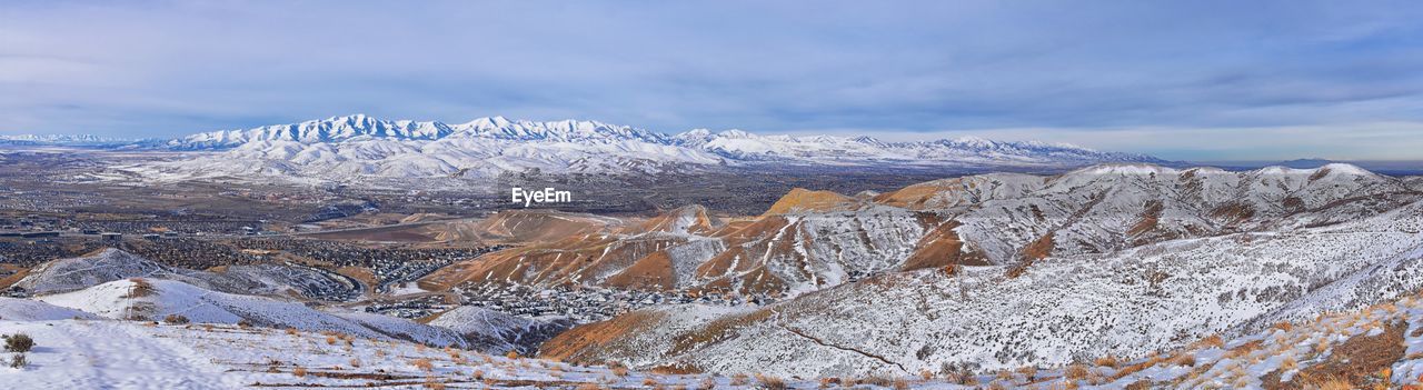snow, winter, cold temperature, mountain, environment, scenics - nature, landscape, beauty in nature, mountain range, sky, cloud, nature, snowcapped mountain, travel destinations, travel, no people, land, tranquil scene, tranquility, ridge, ice, tourism, non-urban scene, frozen, outdoors, wilderness, plateau, day, white, extreme terrain, polar climate, idyllic, blue, coniferous tree, tree, mountain peak, social issues, pinaceae, valley