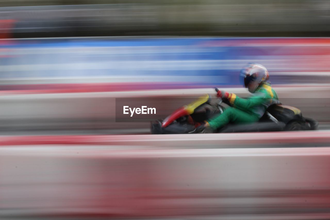Blurred motion of person during formula one racing