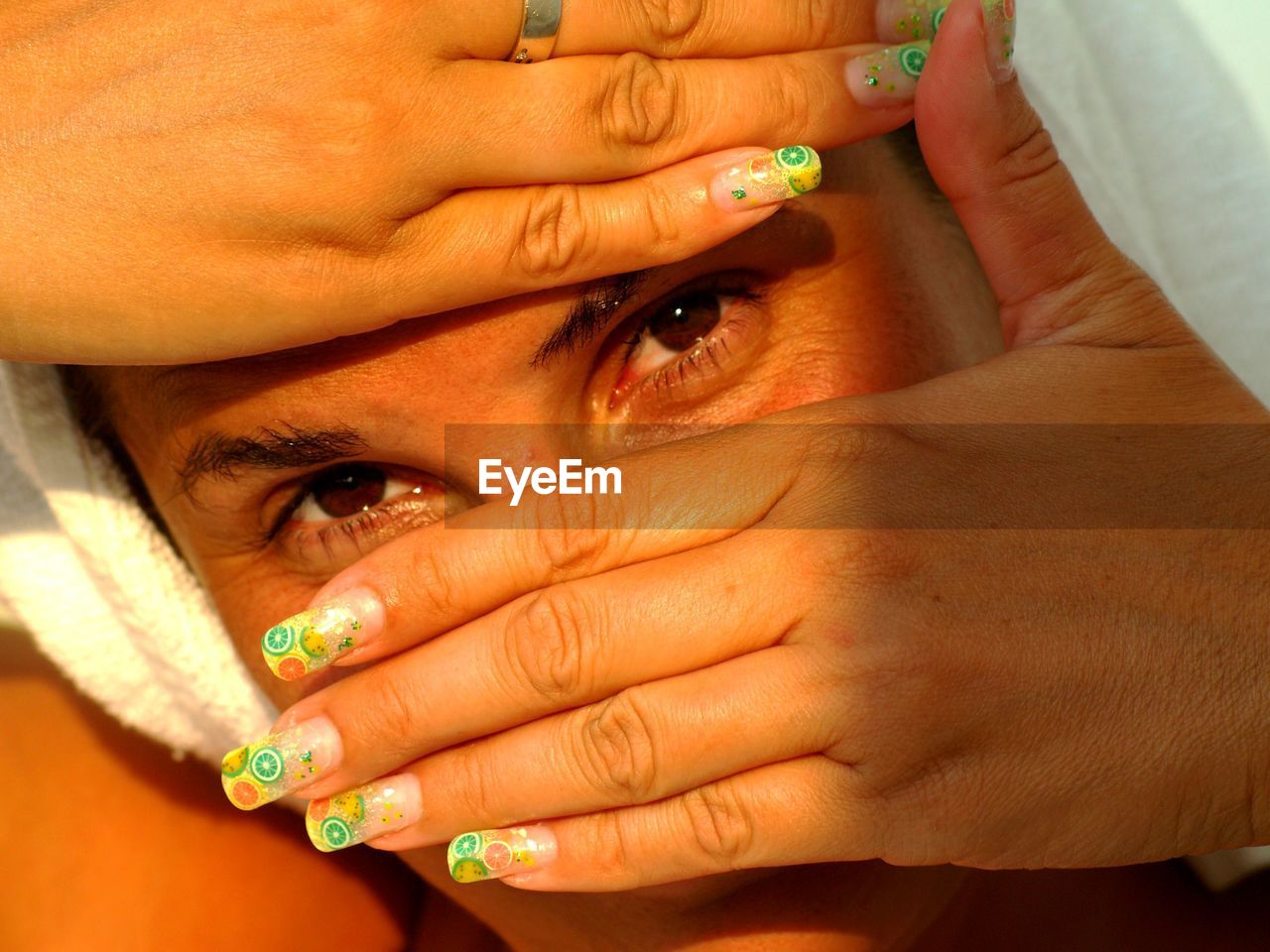 Portrait of mid adult woman with nail art