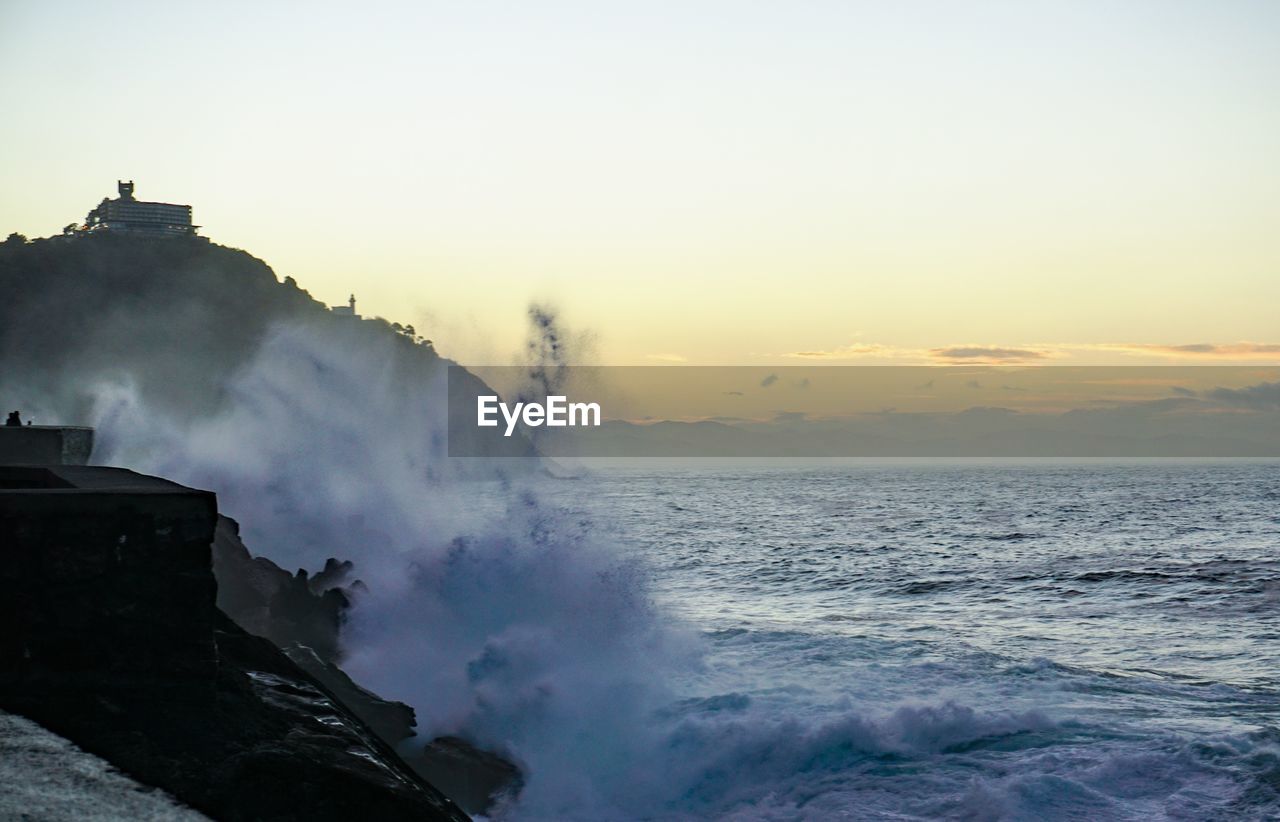 Scenic view of sea against sky during sunset